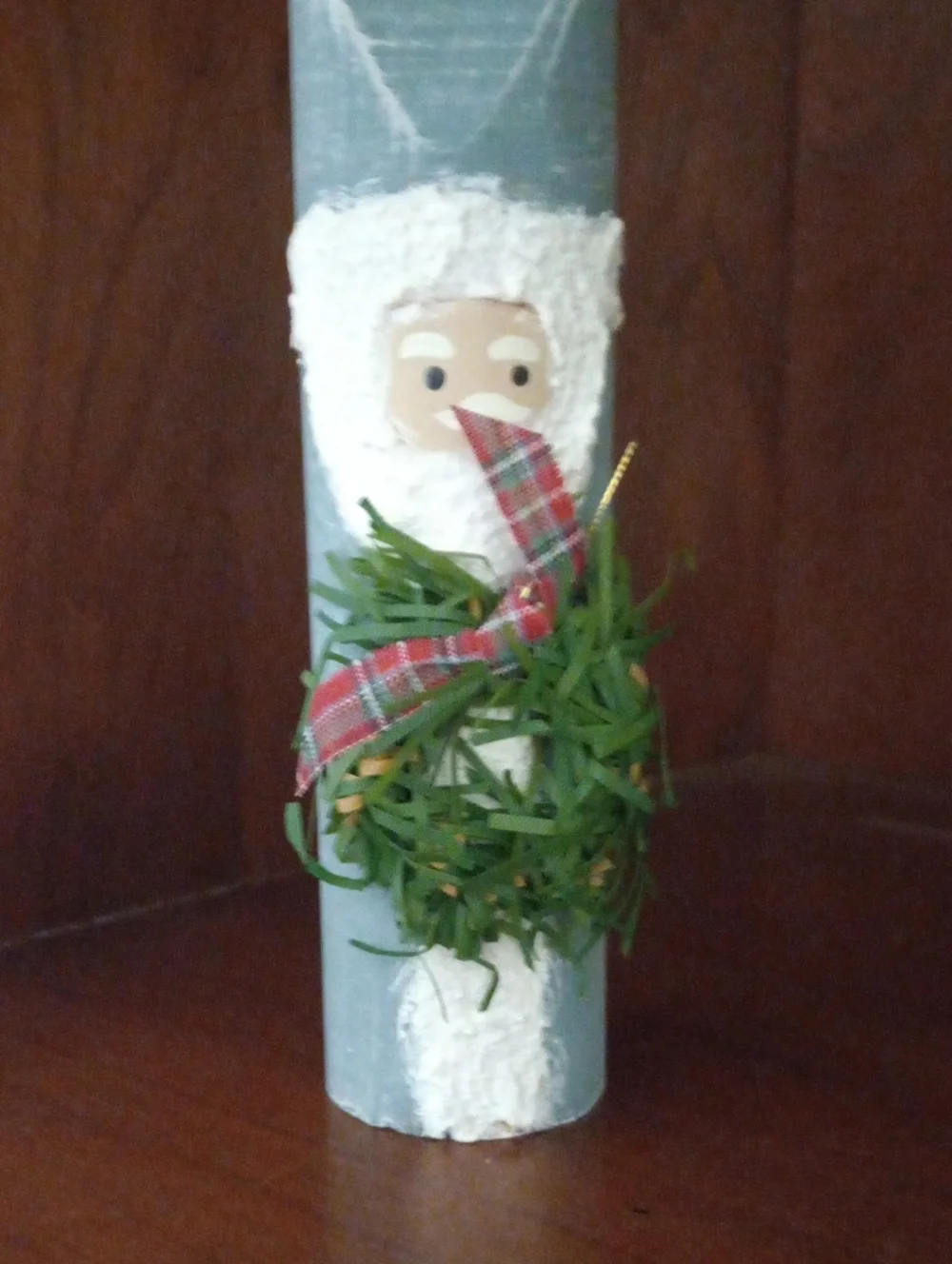 Handcrafted Powder Blue Wood Santa Holiday Figurine with Green Wreath